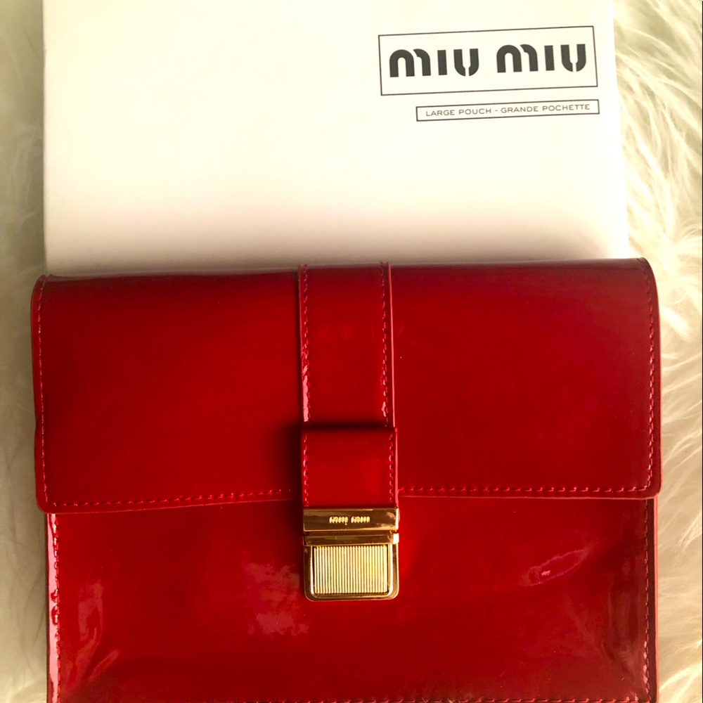 NEW - AUTHENTIC Miu Miu Clutch with buckle.
